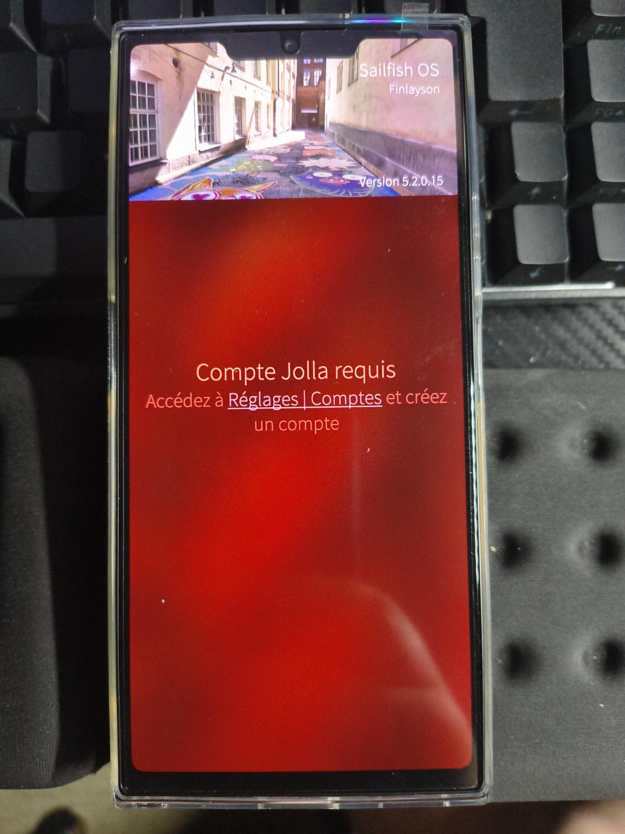 Panneau de mise à jour système sur un Jolla Phone 2026 indiquant qu'un compte Jolla est requis.